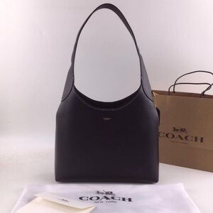 Elegant NWOT Coach Brooklyn 28 Black Leather Satchel